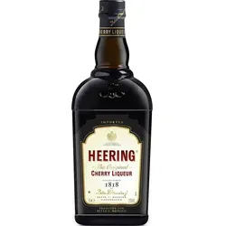Heering Cherry Liqueur 24% Vol - Erlebe den legendären Kirschlikör aus Dänemark, perfekt für Cocktails wie Singapore Sling. Genieße den authentischen Geschmack mit natürlichen Zutaten in einer 0,7-l-Flasche.