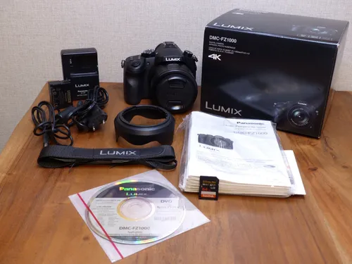 Panasonic LUMIX DMC-FZ1000 Digitalkamera - Bridgekamera mit 20.1 MP, 16x optischem Zoom und 1080p Full HD Filmaufnahme für beeindruckende Fotos und Videos.