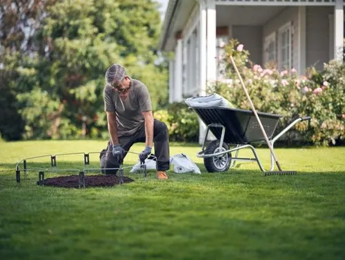 Husqvarna Automower Flächenbegrenzung-Kit - Zubehör für Gartengeräte, sichert verbotene Bereiche mit robusten Stahlbögen und Stoßsensor, ideal für Blumenwiesen und neue Rasenabschnitte.
