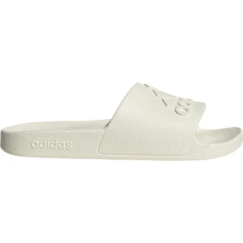 adidas Unisex Adilette Aqua Slides, Off White, 47 EU - Bequeme Badeschuhe aus Synthetik, ideal für Strand und Freizeit, mit rutschfester Sohle für optimalen Halt.