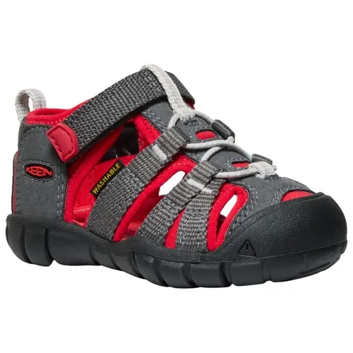 KEEN Jungen Unisex Seacamp 2 CNX Sandalen, Magnet/Red Carpet, 20 EU - Wanderschuhe mit wasserabweisendem Obermaterial und schnell trocknendem Futter. Ideal für Abenteuer im und am Wasser, mit sicherem Sitz dank Bungee-Capture-System.