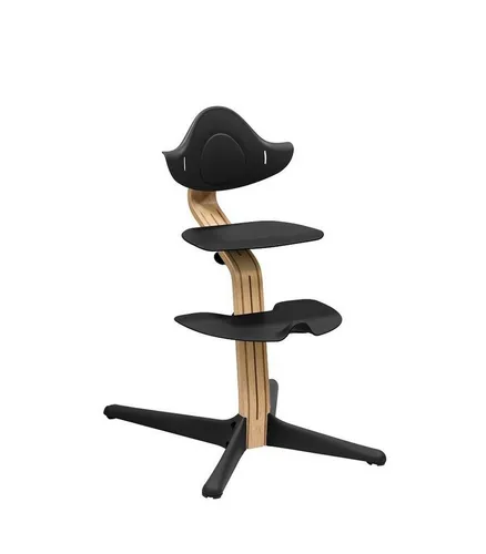 STOKKE® Nomi® Hochstuhl Buche schwarz mit gratis Baby Set - Hochstuhl mit stufenloser Höhenverstellung, ideal für jedes Alter. Inklusive gratis Baby Set für sicheren Sitz ab 6 Monaten. Perfekt für moderne Familien!