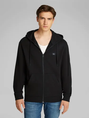 CALVIN KLEIN JEANS WOVEN LABEL ZIP THROUGH HOODIE - Herren Sweatjacke in schwarz, aus 100% Baumwolle, mit Kapuze und Kängurutasche – perfekt für Sport und Freizeit, bequem und stylish.