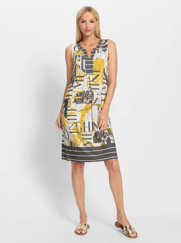 heine Jerseykleid - Sportlich-modisches Jerseykleid - Jerseykleid in sonnengelb mit Glitzerdetails, ideal für lässige Anlässe. Hergestellt aus 95% Viskose, pflegeleicht und bequem für den ganzen Tag.
