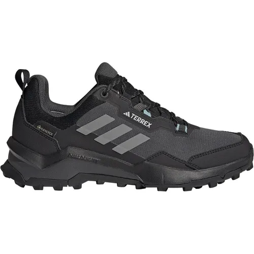 Adidas TERREX AX4 GORE-TEX Wanderschuh - schwarz - Wanderschuhe mit wasserdichter GORE-TEX Membran, ideal für jedes Terrain. Leicht, stabil und mit überragendem Grip für dein nächstes Outdoor-Abenteuer.