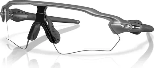 Oakley Radar EV S Path Steel Clear Photo 50% Iridium - Sportbrille - Sportbrillen mit erweitertem Sichtbereich und optimierter Passform für kleinere Gesichter. Ideal für Athleten, die höchste Leistung und Komfort suchen.