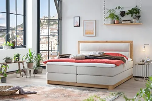 Belanoti Age Boxspringbett 180x200 - Luxuriöses Boxspringbett 180x200 cm mit 7-Zonen Taschenfederkern und Visco-Topper. Massivholz Eiche sorgt für höchste Qualität und Liegekomfort. Inklusive einfacher Lieferung und Aufbau.