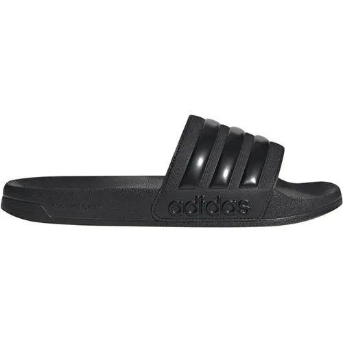 ADIDAS Badeslipper Shower adilette - Badeschuhe mit unschlagbarem Komfort, ideal für Schwimmbad, Umkleide oder Zuhause. Leicht und dämpfend für angenehmes Tragegefühl, sportlicher Style mit adidas Logo und 3-Streifen.