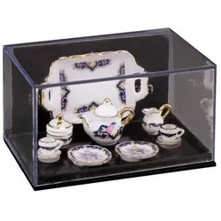 Reutter Miniatur Teeset "Royal Blue" - Entdecken Sie die filigranen Miniaturen von Reutter! Das handgefertigte Teeset mit 24 Karat Goldverzierungen ist ideal für Puppenstuben und begeistert Sammler weltweit. Perfekte Größe für kreative Präsentationen.