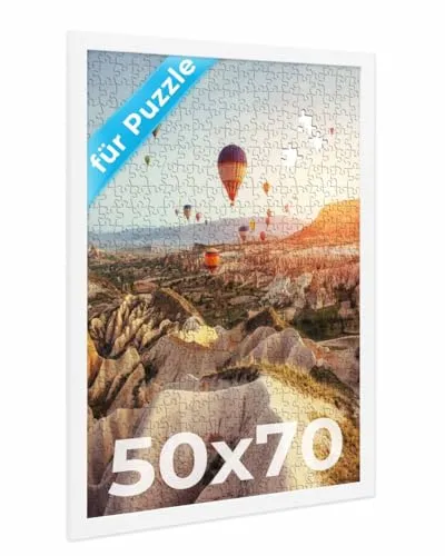 PHOTOLINI Bilderrahmen 50x70 Weiß für Puzzle - Stylischer Bilderrahmen 50x70 aus Holz MDF für Puzzles bis 1000 Teile. Bruchsicheres Acrylglas schützt Ihre Kunstwerke. Einfaches Wechseln der Motive und leichtes Aufhängen in Hoch- oder Querformat.