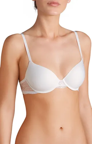 Triumph Body Make-Up Light Lace WHP Damen BH 75D - Eleganter Damen BH in Größe 75D mit Bügel und unifarbenem Design. Bietet hohen Tragekomfort und eine perfekte Passform für den Alltag.