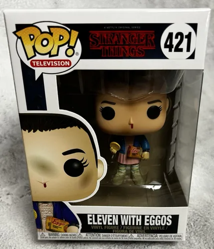 Funko! Pop! Television Stranger Things - Eleven Figur mit Eggos - Sammlerstück mit 25 cm Höhe, perfekt für Fans der Serie. Bringen Sie die Welt von Stranger Things in Ihr Zuhause!