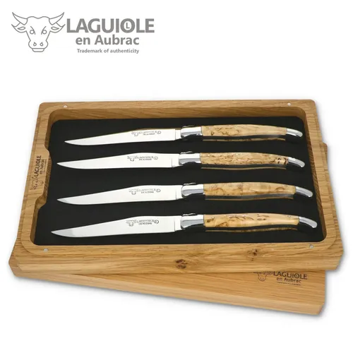 Laguiole en Aubrac Steakmesser 42C99BHIH BRI 4er Set – Edle Birkenholz-Griffe - Exklusives 4er Set französischer Steakmesser mit handgefertigten Griffen aus gemasertem Birkenholz. Ideal für besondere Anlässe und eine stilvolle Tischgestaltung. Inklusive hochwertiger Holzbox.