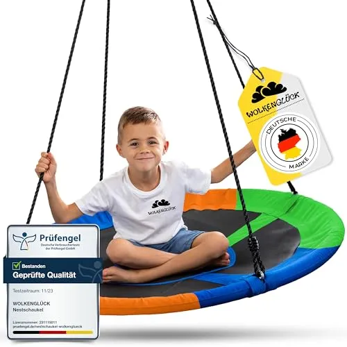 WOLKENGLÜCK® Nestschaukel [Ø 110 cm] - Höhenverstellbare Schaukel für Kinder & Erwachsene - Bunt - Erleben Sie maximalen Schaukelspaß mit der WOLKENGLÜCK Nestschaukel! Ideal für drinnen und draußen, bietet sie Komfort und Sicherheit für die ganze Familie. Mit robusten Materialien und verschiedenen Aufhänge-Optionen für individuelles Schwingen.