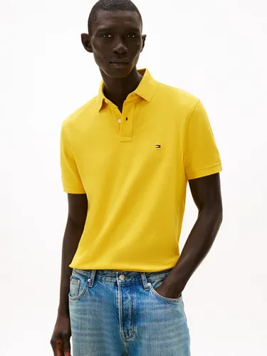 Tommy Hilfiger Herren 1985 Regular Polo in Gelb, Größe XL - Stylisches und originales Polo von Tommy Hilfiger, nachhaltig produziert und ideal für lässige Outfits. Perfekt für den Alltag und bietet hohen Tragekomfort.