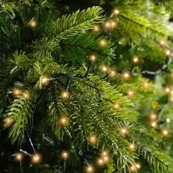 LED Lichterkette Compact TWINKLE - 500 bernsteinfarbene LEDs - 11m - 8 Modi - für Innen und Außen - dunkelgrün - Gestalte stimmungsvolle Dekorationen mit der LED Lichterkette Compact TWINKLE! Diese wetterfeste Kette mit 500 LEDs bietet 8 verschiedene Lichtmodi und einen Timer für flexibles Beleuchtungserlebnis, ideal für Weihnachtsbäume und Außenbereiche.