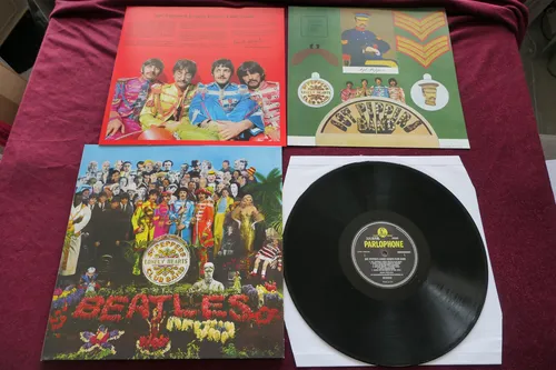 The Beatles...LP...Sct.Peppers Lonely Hearts Club Band ( 180gr.+Poster+Booklet )