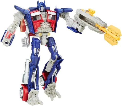 Transformers Universal Studios Deluxe Class Optimus Prime Figur - Actionfiguren für Kinder mit 2-in-1-Funktion: Die Optimus Prime Figur konvertiert in 12 Schritten von Roboter in Fahrzeugmodus und zurück, inklusive Blaster und Energon-Axt.