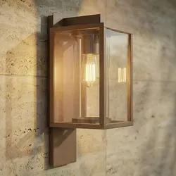 Lucande Außenwandleuchte Ferda, hängend, braun, IP44 - Außenleuchte Ferda aus braunem Aluminium und Glas, ideal für Terrasse und Balkon. Dimmbar für individuelle Lichtstimmung, schützt vor Spritzwasser mit IP44.