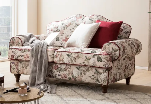 Elita 2-Sitzer Sofa in Creme mit Blumen Design - Stilvolles Landhaus Sofa mit floralem Muster, ideal für gemütliche Wohnzimmer. Mit bequemem Bonell Federkern und losen Sitzkissen für höchsten Komfort.