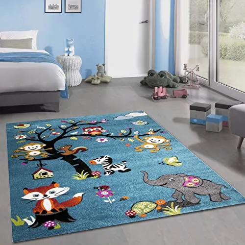CARPETIA Kinderteppich mit Tiermotiven in Blau, 120 x 170 cm - PRAKTISCH: Pflegeleichter Teppich aus strapazierfähigem Polypropylen, ideal für Fußbodenheizung. KINDGERECHT: Bunte Tiermotive fördern die Fantasie und machen das Kinderzimmer lebendig.