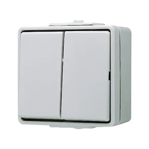 Jung Doppeltaster 635 W IP44 grau - Robuster Doppeltaster für Aufputzmontage, ideal für den Innen- und Außenbereich mit IP44-Schutz. Ergonomische Wippe und 10A Bemessungsstrom für zuverlässige Steuerung.