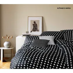 Elegante Mako-Satin Bettwäsche Bubbles - 135x200 cm + 40x80 cm schwarz-weiss - Hochwertige Mako-Satin Bettwäsche Bubbles in schwarz-weiß, mit stylischem Design und praktischem Reißverschluss. Pflegeleicht und ideal für ein modernes Schlafzimmer.
