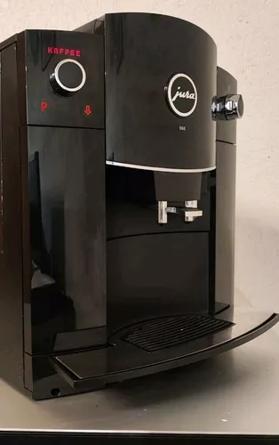 JURA D6 Kaffeemaschine Piano Black - inkl. 1 Kg Kaffee - Kaffeevollautomat mit intuitivem Display und Easy Cappuccino-System für perfekten Milchschaum. Genießen Sie 6 Kaffeespezialitäten in Barista-Qualität. Perfekt für Kaffee-Liebhaber!