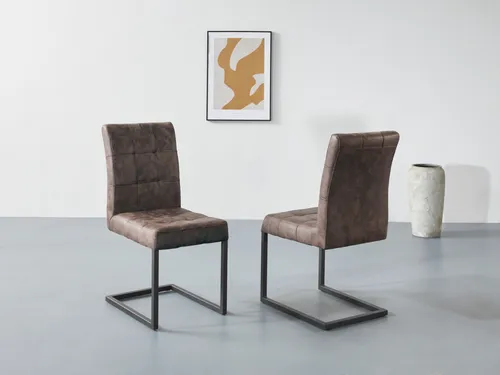 Schwingstuhl Vintage Braun mit Metallgestell - Stuhl in Vintage Braun, ideal für Wohnzimmer oder Esszimmer, mit komfortabler Steppung und robustem Metallgestell für lange Lebensdauer.