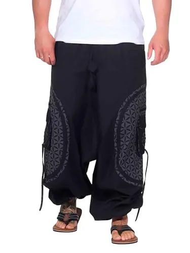 Kunst und Magie Trendige Haremshose mit bunten Mustern - Bequeme Unisex-Haremshose aus 100% Baumwolle mit modischen Patches, ideal für entspannte Tage. Mit praktischem Kordelzug und mehreren Taschen für zusätzlichen Komfort.