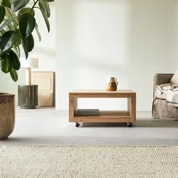 Tikamoon Couchtisch Anoa aus Eichenholz 80 cm - Der stilvolle Couchtisch „Anoa“ aus Eichenholz von Tikamoon bringt natürliche Eleganz in Ihr Wohnzimmer. Mit praktischem Fach für Zeitschriften und kompakten Maßen ist er ideal für jeden Raum.