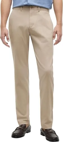 Chinohose TOMMY HILFIGER "CORE HARLEM ESSENTIAL" - Herren-Stoffhose in Batique Khaki, Tapered Fit für einen modernen Look, aus pflegeleichtem Twill mit 97% Baumwolle und 3% Elasthan für optimalen Tragekomfort.