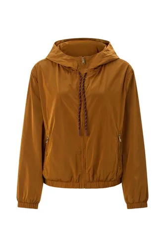Rich & Royal Damen Windbreaker SHORT HOODED WIND BREAKER Regular Fit - Der sportliche Windbreaker von Rich & Royal verbindet Funktionalität mit urbanem Stil. Mit Kapuze, Reißverschluss-Taschen und elastischen Säumen ist er ideal für aktive Tage im Freien. Leicht und windabweisend.