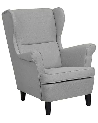 Eleganter Ohrensessel in Grau mit Komfort - Ohren- & Armlehnensessel, bequeme Polsterung und elegante Ausstrahlung, perfekt zum Entspannen und ideal kombinierbar mit klassischen Einrichtungsstilen.