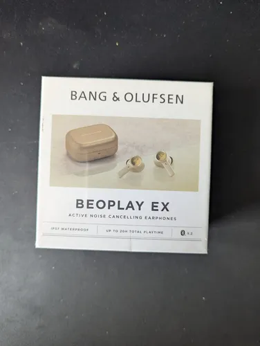Bang & Olufsen Beoplay EX Gold Tone - Kabellose In-Ear Kopfhörer - Premium Kopfhörer mit aktiver Geräuschunterdrückung, bis zu 28 Stunden Akkulaufzeit und wasserdichtem Design. Genießen Sie herausragenden Klang und Komfort in elegantem Gold.