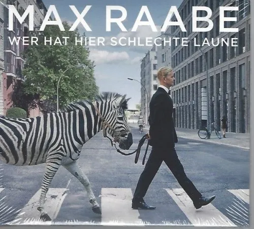 Max Raabe - Wer Hat Hier Schlechte Laune - Digipack - CD - Erleben Sie die musikalische Raffinesse von Max Raabe mit seinem Album 'Wer Hat Hier Schlechte Laune'. Perfekt für jeden Musikliebhaber, der stilvolle Klänge schätzt! Ideal als Geschenk oder für die eigene Sammlung!','category':'Musik & Tonaufnahmen