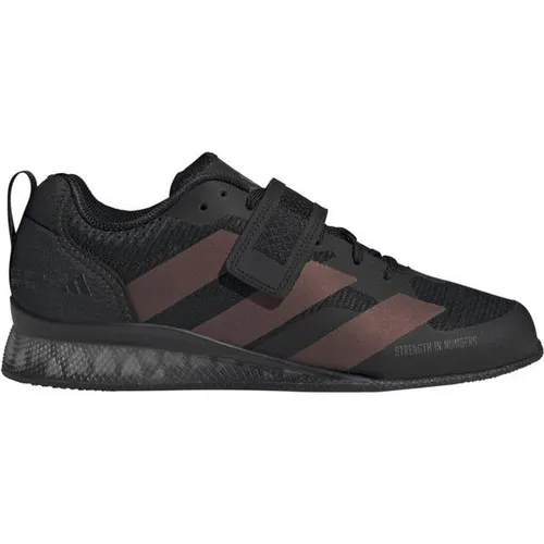 adidas Adipower Weightlifting III Herren-Fitnessschuhe in Schwarz/Carbon, Größe 44 2/3 - Ideal für Gewichtheber: Der adidas Adipower Weightlifting III bietet einen stabilen Halt dank Riemen und Schnürsenkeln. Der erhöhte Fersenbereich sorgt für eine optimale Positionierung auf der Matte.