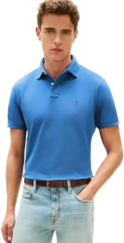 Tommy Hilfiger Poloshirt 1985 REGULAR POLO blau XL - Stylisches Poloshirt aus hochwertigem Piqué-Material, ideal für den Casual-Look. Mit Logostickerei und praktischen Schlitzen für optimalen Tragekomfort.