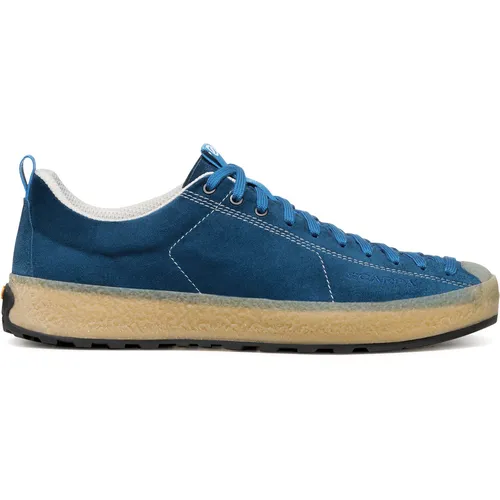 Scarpa Mojito Wrap sea blue (952) 45,5 – Stylischer Unisex-Schuh - Der Scarpa Mojito Wrap vereint urbanen Stil mit Kletterrobustheit. Dank individueller Schnürung und atmungsaktiver Technologie bleibt dein Komfort auch bei Outdoor-Aktivitäten gewährleistet.