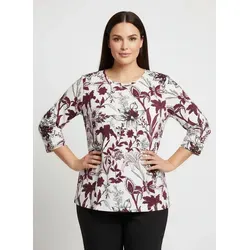 sheego Print-Shirt 273753_48 - Elegantes Print-Shirt mit floralem Design, aus geschmeidig weicher Viskose in umweltfreundlicher Qualität. Perfekt für den Alltag mit Rundhals-Ausschnitt und 3/4-Ärmeln.
