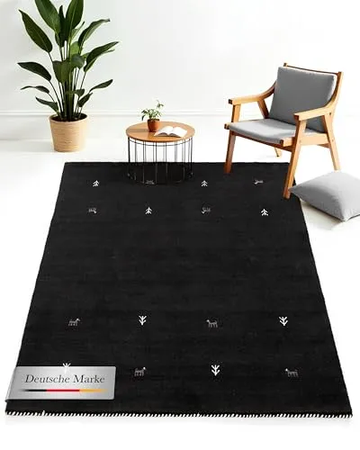 carpetfine Wollteppich Gabbeh Uni Schwarz 80x150 cm | Moderner und langlebiger Teppich für Ihr Zuhause - Hochwertiger Wollteppich in zeitlosem Schwarz, ideal für Wohn- und Schlafzimmer. Strapazierfähig und pflegeleicht – perfekt für jeden Wohnbereich. Genießen Sie die angenehme Atmosphäre!