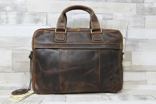 Billy the Kid Ranger Leder Laptoptasche A4 - Hochwertige Aktentasche aus Leder für Herren, ideal für Business-Anlässe. Mit abnehmbaren Trägern und gepolstertem Notebook-Schutz.