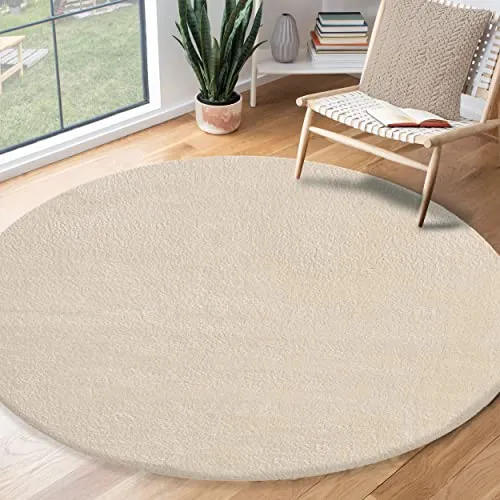 the carpet Teppich Relax round – Waschbarer, rutschfester Wohnzimmerteppich - Flachgewebe-Teppich mit 16 mm Höhe, in Felloptik für ein gemütliches Ambiente. Ideal für Wohnzimmer und Schlafzimmer, pflegeleicht und in vielen Farben erhältlich.