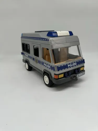 PLAYMOBIL 4023 Polizei Mannschaftswagen mit Lichteffekt - Öffentliche Dienste: Interaktives Spielzeug mit realistischem Lichteffekt, ideal für kreative Rollenspiele und abenteuerliche Einsätze.