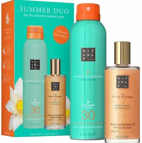 RITUALS THE RITUAL OF KARMA Suncare Set - Sonnenschutzmittel für perfekten Hautschutz und Glanz. Das Set enthält ein SPF 30 Sonnenschutz-Milchspray und ein schimmerndes Körperöl für einen strahlenden Look.