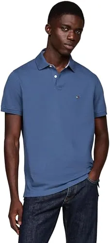 Tommy Hilfiger Regular Fit Poloshirt - Herren-Shirt aus hochwertigem Baumwoll-Elasthan-Mix in Jeansblau, bietet perfekten Tragekomfort und eine stilvolle Passform.