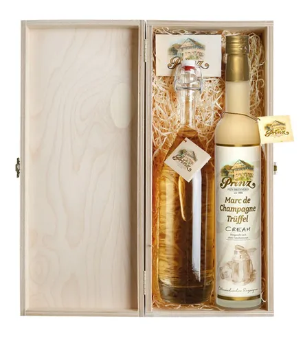 Prinz Geschenk-Set Christbaumlob - Edles Geschenk-Set mit Prinz Alte Williams-Birne und Marc de Champagne Trüffel Cream, stilvoll verpackt in einer hochwertigen Holzkiste – ideal für besondere Anlässe.