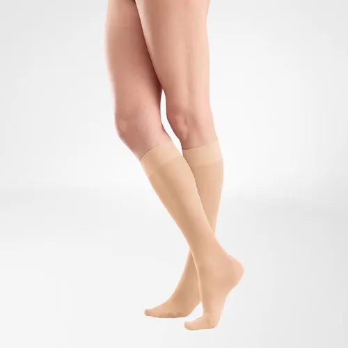 Bauerfeind VenoTrain act sheer elegance AD Strümpfe 70 DEN 1 caramel - Medizinische Kompressionssocken mit elegantem Design, bieten effektive Unterstützung und Komfort für gesunde Beine im Alltag.