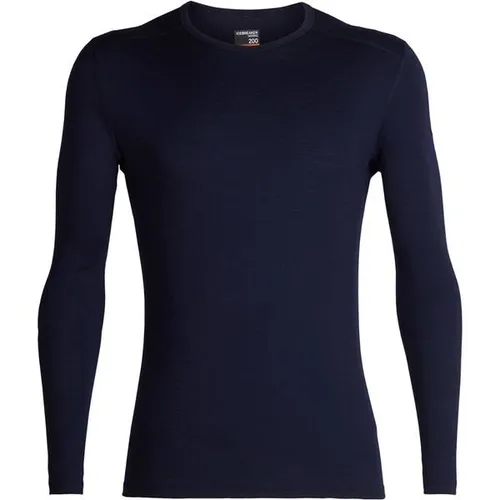 Icebreaker Men 200 Oasis LS Crewe Midnight Navy (XXL) - Funktionsunterwäsche aus 100% Merino, ideal für kalte Abenteuer. Mit versetzten Schulternähten für Komfort unter dem Rucksack und flachen Nähten, die Reibung verhindern.