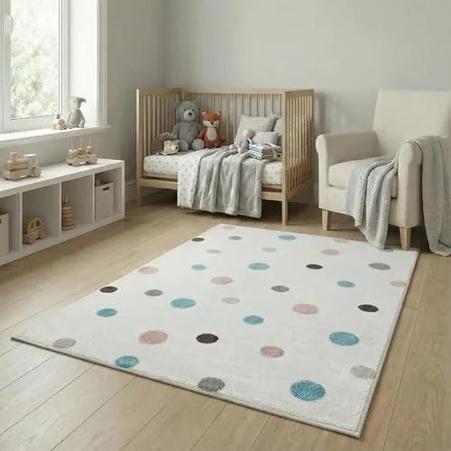 Jimri Kinderteppich DOTS - Gepunktet in Beige, Blau und Rosa für das Kinderzimmer - Der stilvolle Kinderteppich DOTS bringt Freude ins Jugendzimmer. Mit strapazierfähigem PP-Garn und Öko-Tex Zertifizierung ist er ideal für den täglichen Einsatz. Schaffen Sie eine gemütliche Atmosphäre mit diesem modernen Teppich!